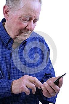 Elderly man dialing cell phone