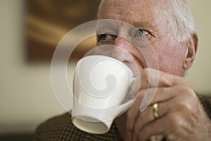 Elderly Man Drinking Coffee