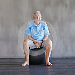 Elderly man, exercise ball and portrait in studio on mockup space with physical therapy, workout and practice. Senior