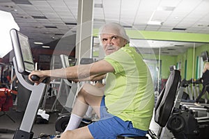 Elderly man in the gym
