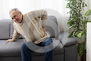 an elderly man has a backache