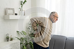 an elderly man has a backache