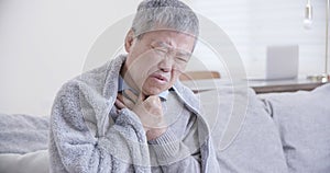 Elderly man has sore throat