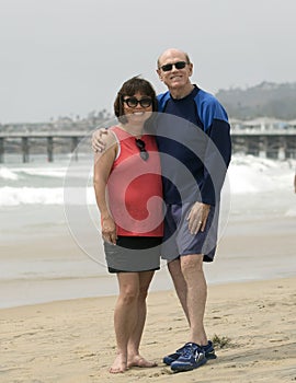 Elderly man and his Korean wife standing on Mission Beach