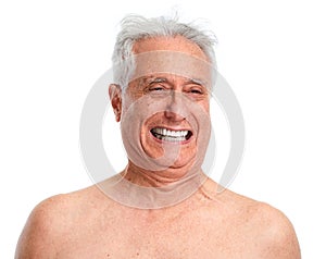 Elderly man laughing .