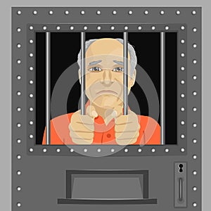 Elderly man looking from behind bars