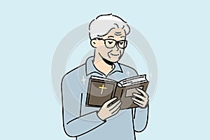 Elderly man looks into Holy Scripture, reads Bible.