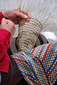 Elderly man makes baskets for use in the fishing industry in the traditional way, in Gallipoli, Puglia, Italy.