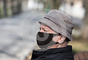 Elderly man in a medical mask