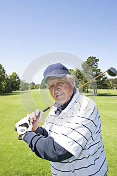 Elderly man Playing Golf