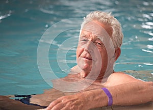 Elderly man in pool