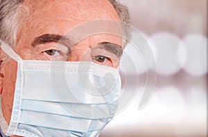 Elderly man with protective mask