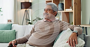Elderly man, remote control and watching television on sofa on retirement, rest and laughing for comedy. Old person