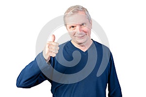 Elderly man shows thumbs up. Isolated on a white background