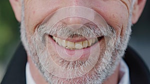 Elderly, man and smile in zoom of teeth, beard and wrinkles while outdoor in New York. Macro, face and mouth for