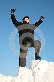 Elderly man on snow hill