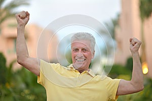 Elderly man at tropic resort