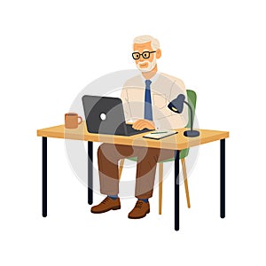Elderly man using laptop at desk. Person working on a laptop