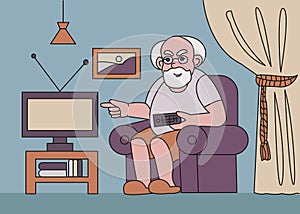 Elderly man watches TV at home.