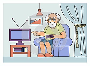 Elderly man watches TV at home.