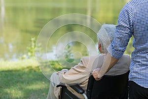 Elderly man on wheelchair