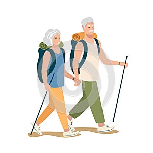 Elderly man and woman go hiking