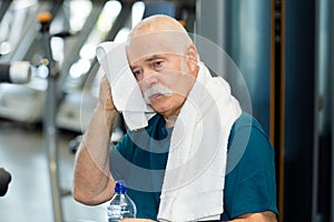 elderly man working out photo