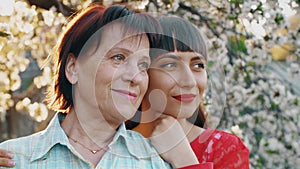 Elderly mother and her adult daughter