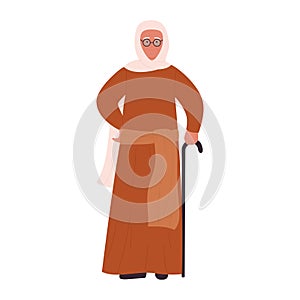 Elderly Muslim grandmother in traditional clothes with cane, senior woman standing