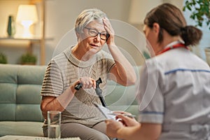 Elderly patient and caregiver