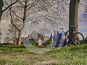 Elderly pensioner on a bicycle travels to