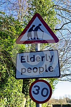 Elderly People Crossing Road Sign