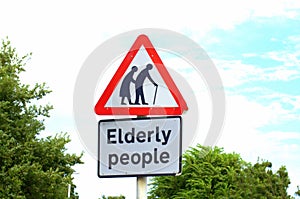 Elderly people crossing sign