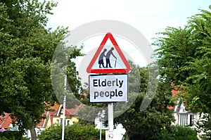 Elderly people crossing sign