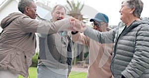 Elderly people, hands together and fitness in teamwork, motivation or support in outdoor unity at old age home. Happy