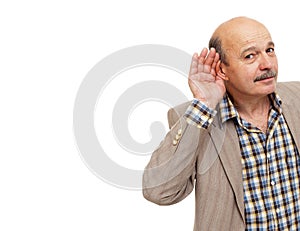 Elderly people with hearing loss tries to listen to the sounds