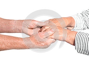Elderly people holding hands together on white background