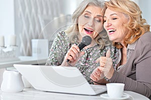 Elderly people singing karaoke