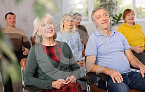 Elderly people study in classroom on refresher courses