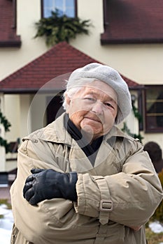 Elderly person and her house