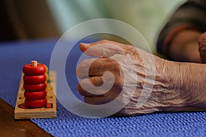 Elderly person after stroke rehabilitation