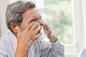 Elderly Self Eye Soothing Massage from irritation problem fatigue and tired photo