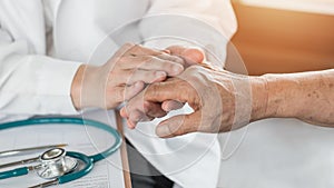 Elderly senior adult patient older person having geriatric doctor consulting and diagnostic examining on aging and mental health