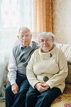 Elderly senior romantic love couple. Old retired man woman together. Aged husband wife in cozy home sweater.Elder