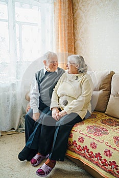 Elderly senior romantic love couple. Old retired man woman together. Aged husband wife in cozy home sweater.Elder