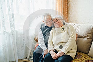 Elderly senior romantic love couple. Old retired man woman together. Aged husband wife in cozy home sweater.Elder