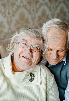 Elderly senior romantic love couple. Old retired man woman together. Aged husband wife in cozy home sweater.Elder