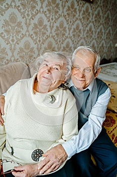 Elderly senior romantic love couple. Old retired man woman together. Aged husband wife in cozy home sweater.Elder