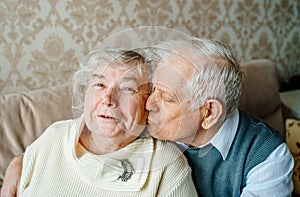 Elderly senior romantic love couple. Old retired man woman together. Aged husband wife in cozy home sweater.Elder