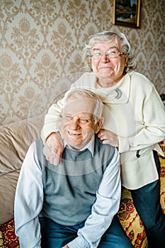 Elderly senior romantic love couple. Old retired man woman together. Aged husband wife in cozy home sweater.Elder